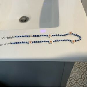 Blue and White Beaded Necklace with Floral Accents
